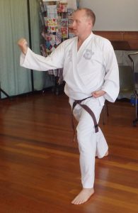 scott rathbone punching at taekwondo class brisbane