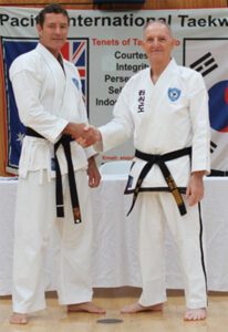 Grand Master Trevor Dicks with 1st Dan Brad Ackfield