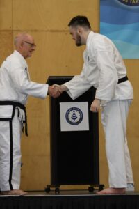 New 1st Dan Black Belt presentation