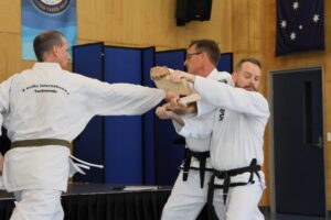 Taekwondo Stafford practicing board breaking