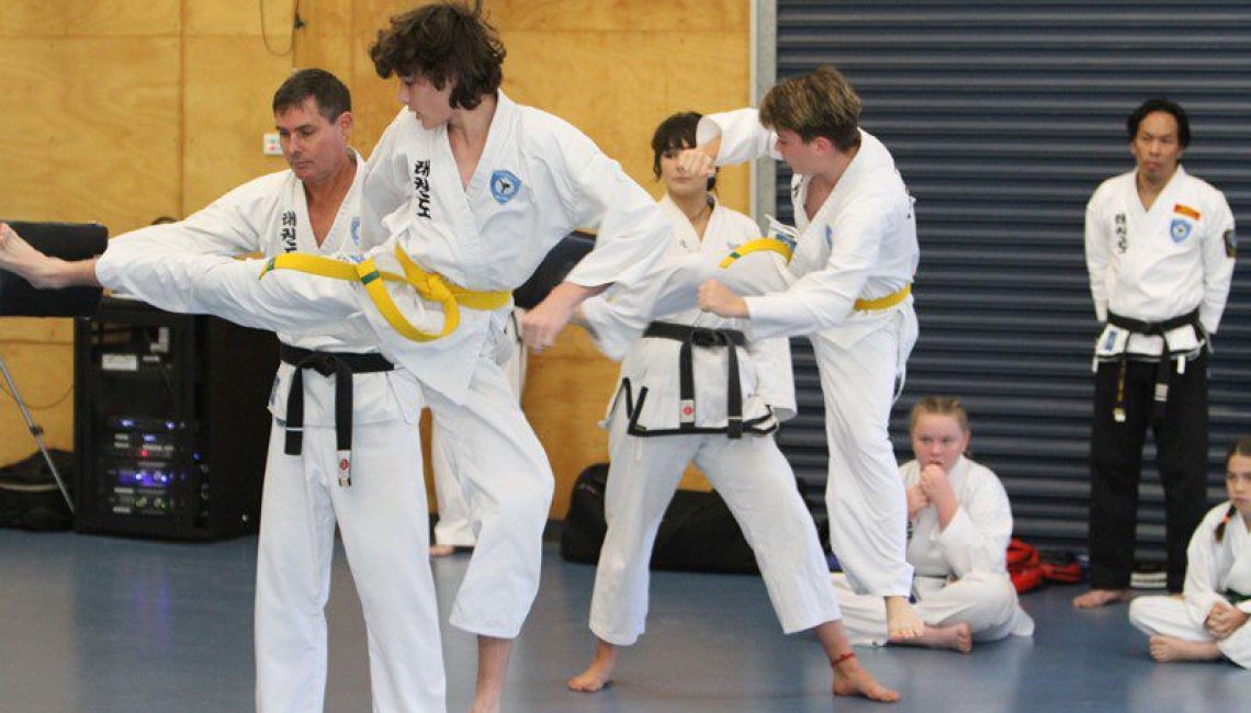 Teens Taekwondo classes, 1 on 1 support learning a new kick